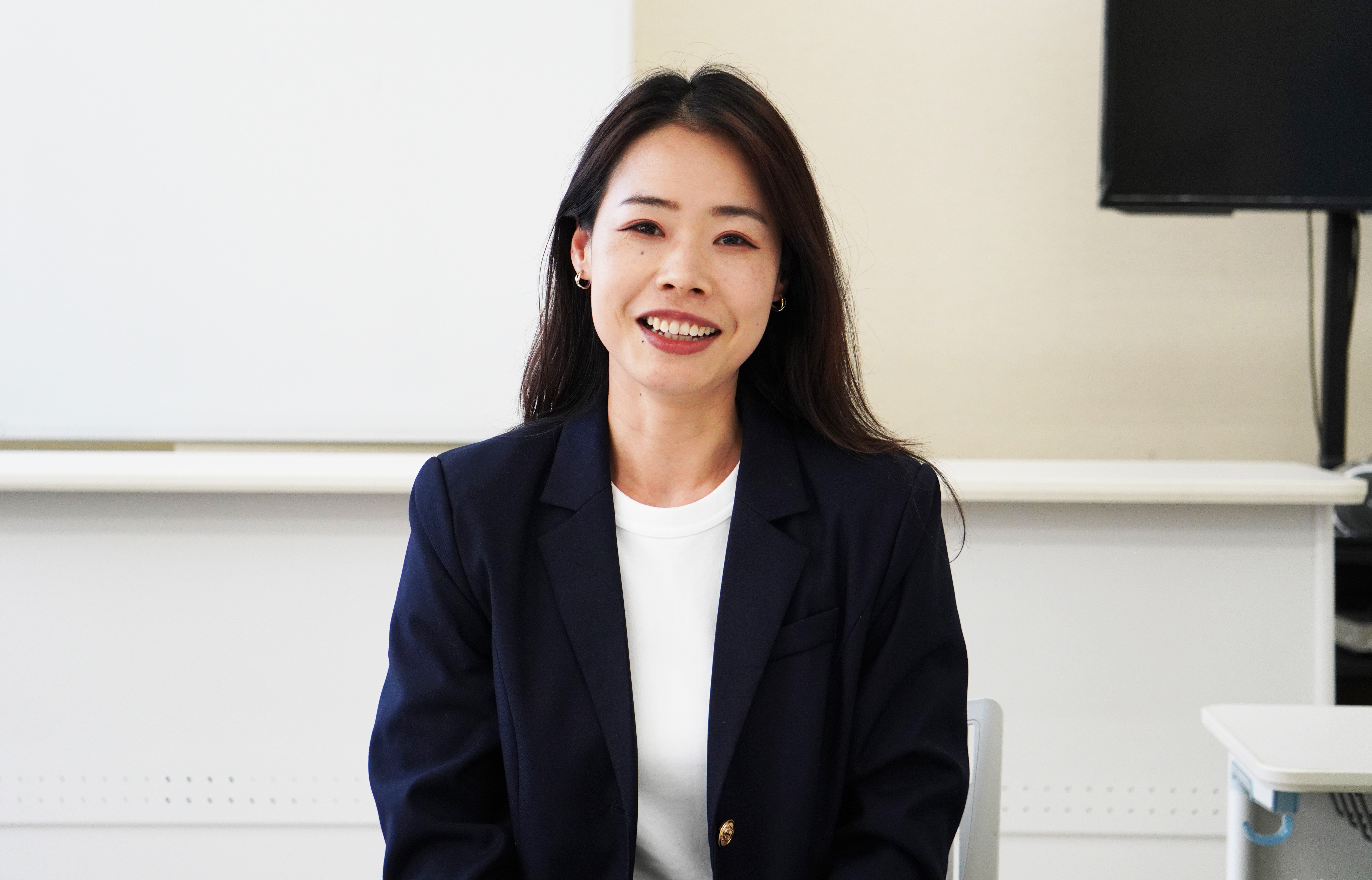 学生課　張さん